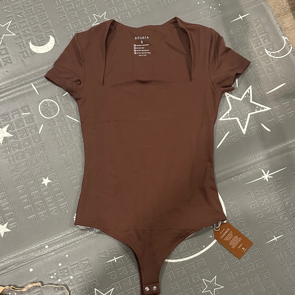 Brown square neck thong body suit by Reoria